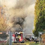 Firefighters battle a blaze early Monday morning at a Kent barn in the 12900 block of Southeast 203rd Place. COURTESY PHOTO, Puget Sound Fire