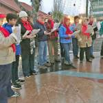 Kent Lutheran Church members sing Christmas carols in the Kent Town Square Plaza during Winterfest last year. The group returns to entertain festival goers this year. MARK KLAAS, Kent Reporter