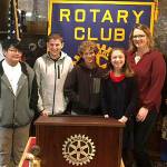 At the Nov. 20 presentation are, from left, Dave Mitchell, Kent Sunrise Rotary member; students Richelle Gust, MacKenzie Pevey, Ethan Loghry and Sophia Soriano, teacher Katrina Baker, and Erica Hanson, Cedar Heights Middle School principal. COURTESY PHOTO