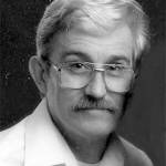 E. RAYMOND WHITE, JR.