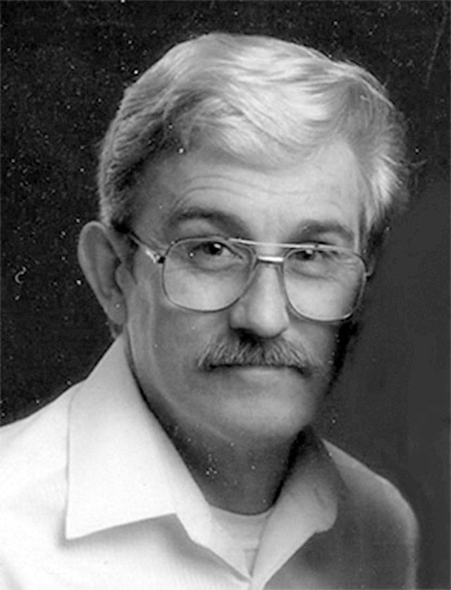 E. RAYMOND WHITE, JR.