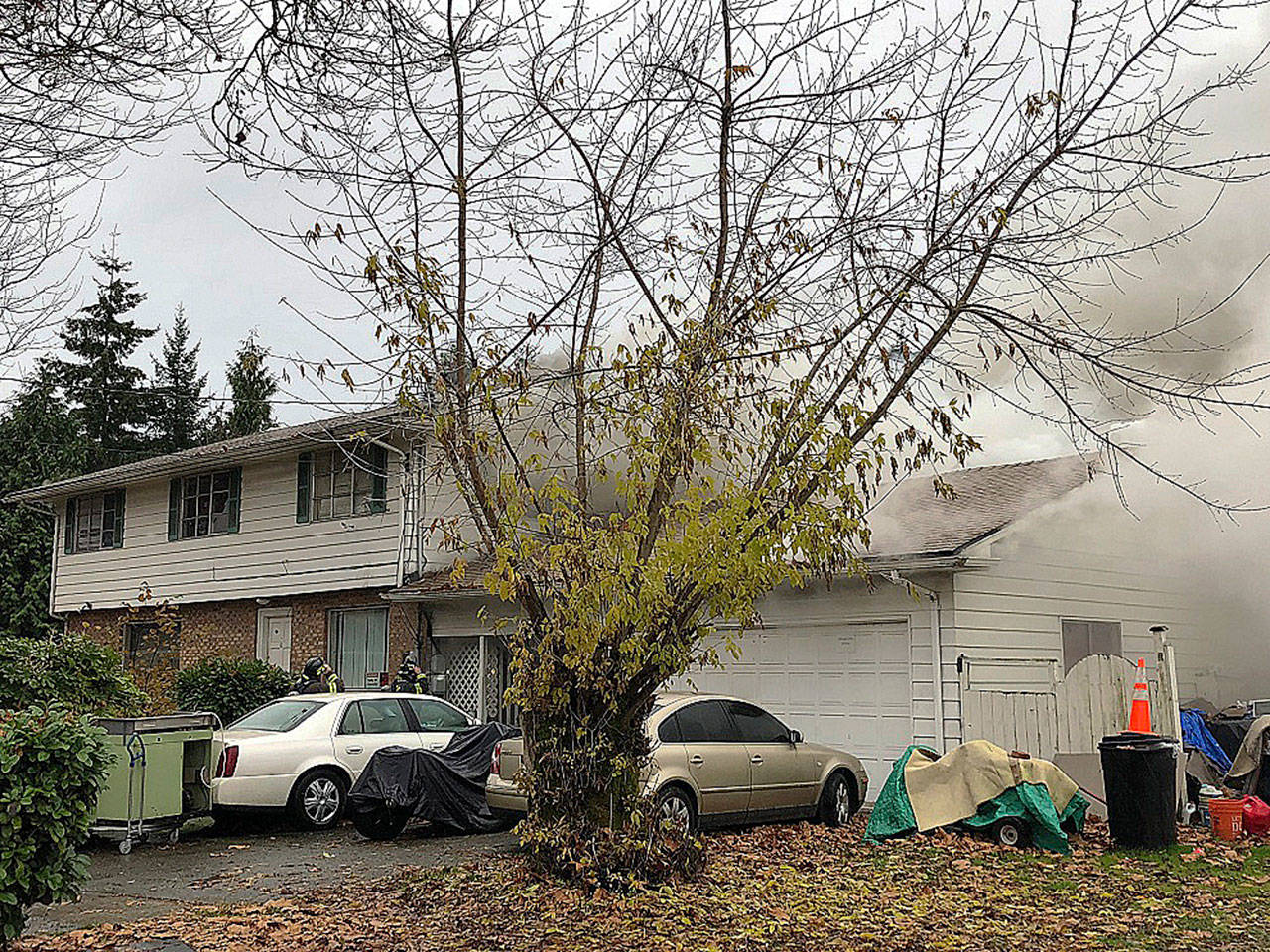 Firefighters battle a blaze Monday morning at a house in the 26100 block of 114th Avenue Southeast. COURTESY PHOTO, Puget Sound RFA
