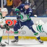 Thunderbirds center Matthew Wedman rifles a shot at Silvertips goalie Dustin Wolf during WHL play Saturday night. COURTESY PHOTO, Brian Liesse, T-Birds