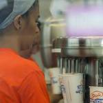 An employee prepares shakes at the new Kent location of DIcks Drive-In. STEVE HUNTER, Kent Reporter