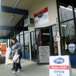 A customer leaves with items Thursday from the Franz Bakery Outlet, 23009 Military Road S., in Kent that will close Feb. 1 after more than 30 years in town. Poulsbo RV, next door to the outlet, brought the property in an effort to stay at the site despite plans by the state Department of Transportation to extend Veterans Drive underneath Interstate 5 as part of the Puget Sound Gateway State Route 509 project. MARK KLAAS, Kent Reporter