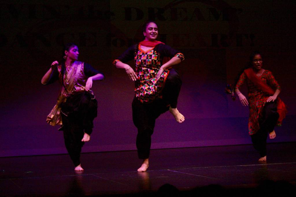 Bhangra dancers delight the audience during Kentridges Dance for Heart program at the schools Performing Arts Center on Friday night. MARK KLAAS, Kent Reporter
