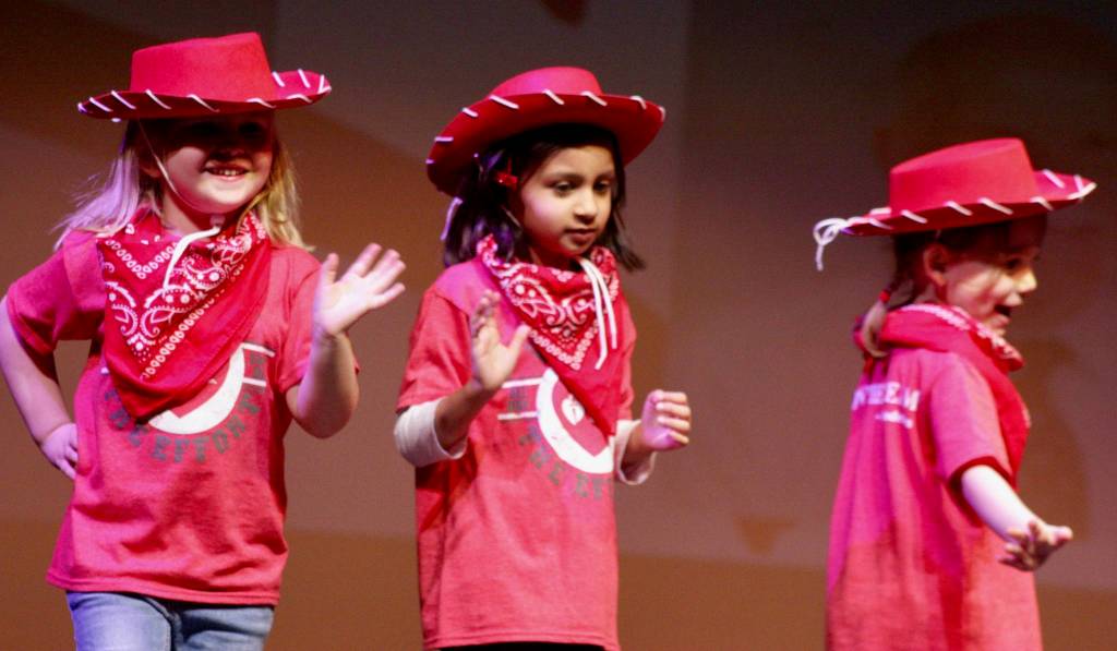 The Little Chargers perform on stage during Kentridges Dance for Heart program at the schools Performing Arts Center on Friday night. MARK KLAAS, Kent Reporter