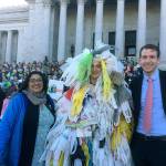 Sen. Mona Das and Rep. Joe Fitzgibbon with the Bag Monster on the steps of the Capitol Building in Olympia. COURTESY PHOTO