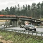 Crews work Tuesday on the new overpass over Highway 167 that will help extend the city of Kents South 224th/228th corridor between the Valley and the East Hill. MARK KLAAS, Kent Reporter