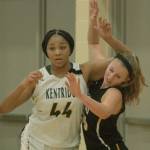 Kentridges JaQuaya Miller tangles with Inglemoors Abby Haller for position during 4A regional play at Auburn Mountainview High School on Saturday. Miller had 24 points and 20 rebounds in the Chargers win. MARK KLAAS, Kent Reporter