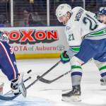 The Thunderbirds Matthew Wedman tries to drill the puck past Americans goalie Talyn Boyko during Western Hockey League play at the accesso ShoWare Center on Sunday night. Wedman scored two goals and had an assist in the T-Birds 6-3 win. COURTESY PHOTO, Brian Liesse, T-Birds