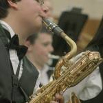 Darwin Gomez, an eighth-grader with the Meeker Middle School Jazz Band, plays St. Louis Blues on his baritone saxophone during Kent Kids Arts Day last Saturday. MARK KLAAS, Kent Reporter