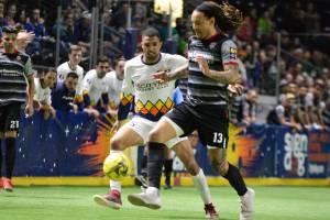 The Stars Mike Ramos battles the Furys Jermaine Jones, right, for the ball during MASL action Friday night. COURTESY PHOTO, Stars