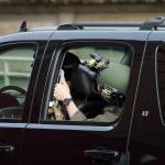Obamas motorcade, which included armed police guards, waits in the alley behind the Tacoma Public Library on Sunday, March 24. Olivia Sullivan/Federal Way Mirror