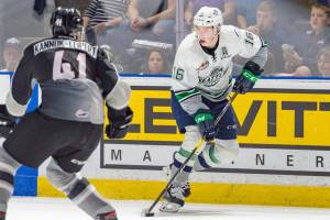The Thunderbirds Noah Philp looks to pass the puck as the Giants Alex Kannok Leipert defends during Game 3 Tuesday. COURTESY PHOTO, Brian Liesse, T-Birds