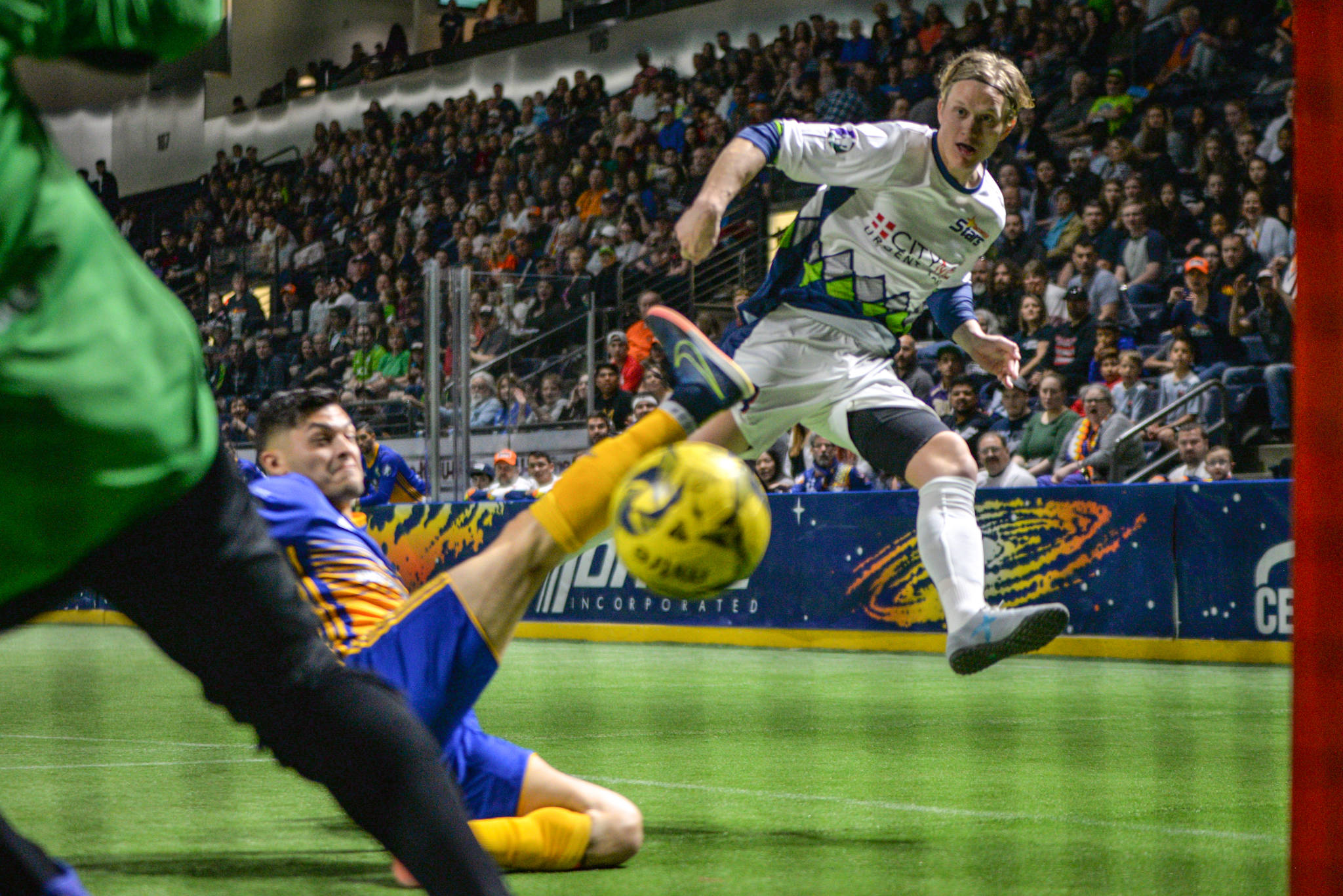 The Stars Philip Lund and a Sockers player pursue the ball during MASL action Sunday. COURTESY PHOTO, Stars