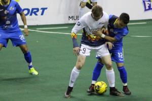 The Stars Derek Johnson (9) and a Flash player battle the ball during MASL play Sunday. COURTESY PHOTO, Stars
