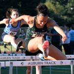 Kentwoods Faith Marshall charges to a third-place finish in the NPSL 100-meter hurdles with a personal-best 14.71 seconds. RACHEL CIAMPI, Kent Reporter