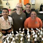 On staff at Café on Fourth are, from left, Abraham Gomez, owner Sheldon Smith, Jared Estrella and Jessica Higa. MARK KLAAS, Kent Reporter