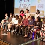 The Kent-Meridian High School scholars, the top 5 percent of graduating students, are honored on stage with their principal, David Radford. COURTESY PHOTO