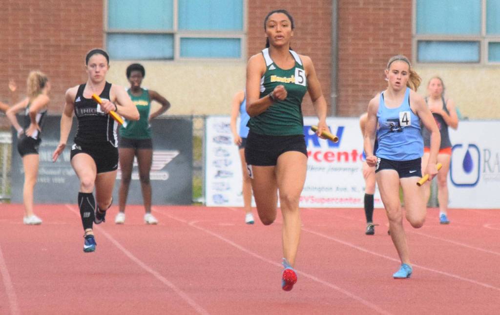 Kentridges Lauryn Ford anchors the 400-meter relay at the bi-district meet. Ford and the Chargers finished in 48.54 seconds, the second-fastest time at the meet. RACHEL CIAMPI, Kent Reporter