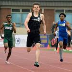 Kentwoods Daniel Gaik darts to the finish line in his 400-meter heat at the bi-district meet on May 16. Gaik qualified for state with the second-best time of 49.62 seconds. RACHEL CIAMPI, Kent Reporter
