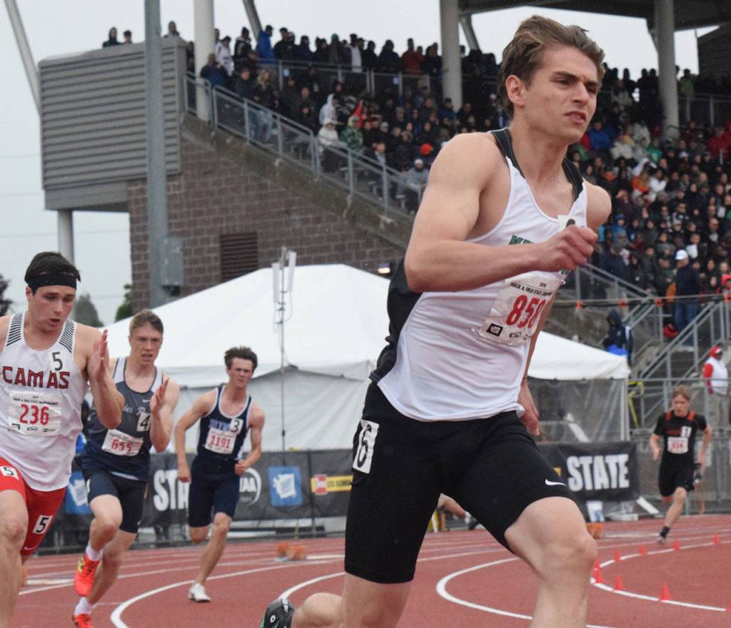 Kentwoods Daniel Gaik begins his 400-meter dash. He finished second with a personal-best 49.03 seconds. RACHEL CIAMPI, Kent Reporter