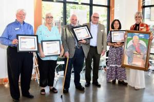 At the awards program were, from left: Sam Nigh; Diane Radischat; Loren Bliss; Jay Woolford, Dr. Tamiko Olson; Karen Lucas. COURTESY PHOTO, Jamie Mitchell