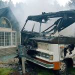 Firefighters quickly doused a burning motorhome after it wound up off the road and close to an office Thursday afternoon. There were no injuries. COURTESY PHOTO, Puget Sound RFA