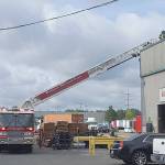 Kent firefighters respond to a fire June 6 at IP Recycling, 1225 Sixth Ave. N. A sprinkler system helped keep the fire contained. COURTESY PHOTO, Puget Sound Fire