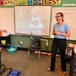 Brittan Stockert, Babies of Homelessness executive director, explains her work to students in Vernon Hosannahs sixth grade classroom during Career Day at Meridian Elementary School. Babies of Homelessness, a nonprofit organization, is a crisis response team that brings basic necessities to families with children experiencing homelessness in the Seattle area. MARK KLAAS, Kent Reporter