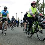 Cyclists begin the World Reliefs fifth annual SEA-TRI-KAN bike ride with a group sendoff from Hogan Park at Russel Road on Wednesday morning, June 19. RACHEL CIAMPI, Kent Reporter