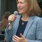 U.S. Rep. Kim Schrier, D-Wash., speaks to a gathering outside HealthPoint Auburn North on Thursday afternoon. The Congresswoman talked about the importance of childhood immunizations. MARK KLAAS, Kent Reporter