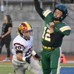 Kentridge quarterback Chance Guadiz delivers a pass against Enumclaw during the first half Thursday at French Field. KEVIN HANSON, Courier-Herald