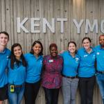 Kelly Guy, the Kent YMCAs executive director, fourth from left, and staff. COURTESY PHOTO, Brandon Patoc (patoc.co)