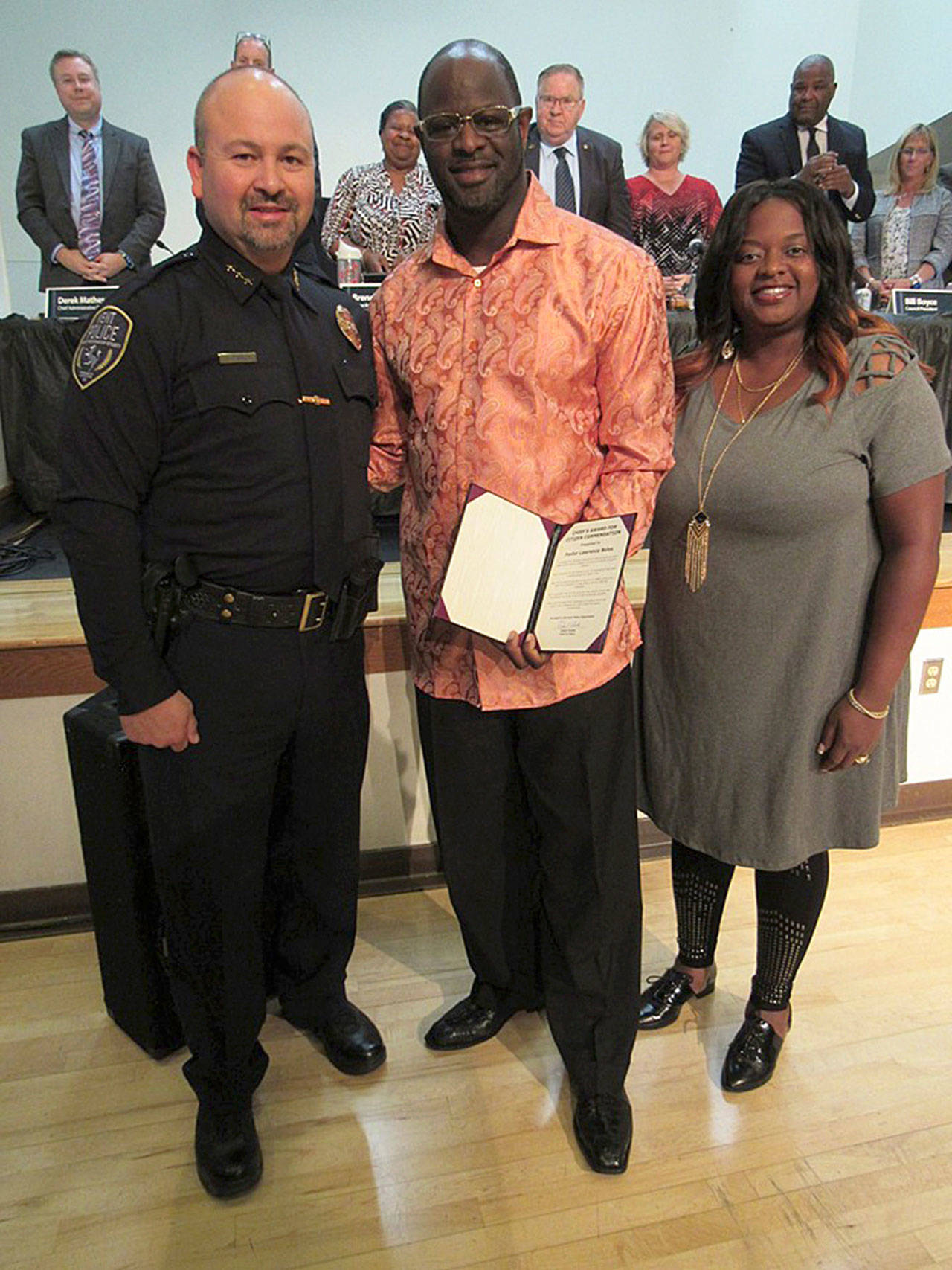 Kent Police Chief Rafael Padilla honors Pastor Lawrence Boles III and Lady Jacqualine Boles at the Sept. 17 City Council meeting at Kent Commons. COURTESY PHOTO, City of Kent