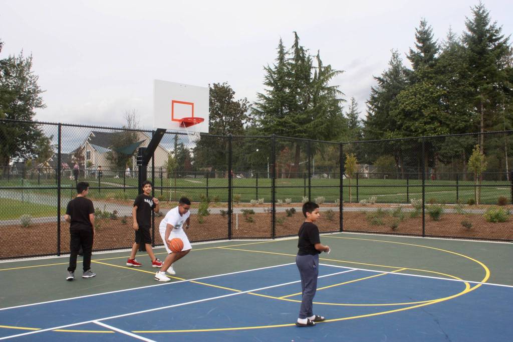 The park offers a new multi-sport court with a durable surface. MARK KLAAS, Kent Reporter