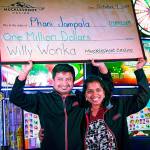 Phani Jampala and his wife celebrate after the Renton man won more than a million dollars playing on the Muckleshoot Casinos newly installed Willy Wonka World of Wonka machines. COURTESY PHOTO, Muckleshoot Casino