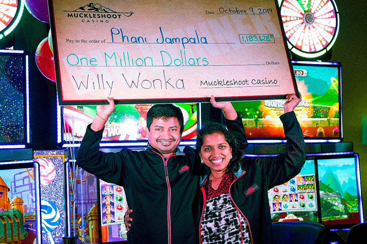 Phani Jampala and his wife celebrate after the Renton man won more than a million dollars playing on the Muckleshoot Casinos newly installed Willy Wonka World of Wonka machines. COURTESY PHOTO, Muckleshoot Casino