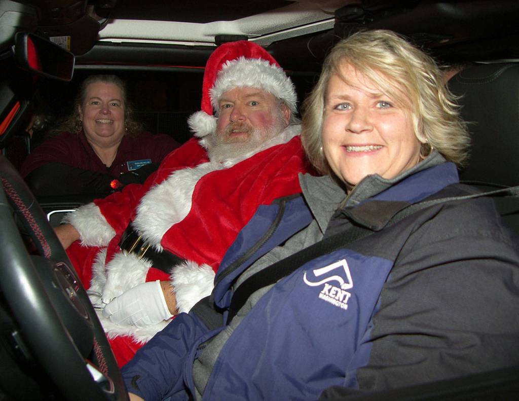 Mayor Dana Ralph and Santa and company arrive on time. DON DINSMORE, for the Kent Reporter