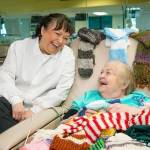Theresa Tofflemire, left, nurse manager of the Northwest Kidney Centers dialysis clinic in Renton, shares a laugh with patient Janice Baker. COURTESY PHOTO, C.B. Bell