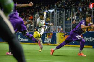 Tacomas Douglas Lima sails his shot past Harrisburg keeper William Banahene in the Stars 11-10 loss on Friday. COURTESY PHOTO, Stars