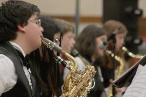Darwin Gomez performs on his baritone saxophone with the Meeker Middle School Jazz Band during Kent Kids Arts Day last year. MARK KLAAS, Kent Reporter