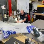 Sewing up solutions: South King firefighter designs prototype for protective gown shortage
