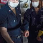 Aviation Electricians Mate 2nd Class Thomas Payne, of Kent, left, demonstrates how to steer the Navys only forward-deployed aircraft carrier USS Ronald Reagan to Aviation Electronics Technician 3rd Class Raylene Chavez. COURTESY PHOTO, U.S. Navy, Janweb B. Lagazo