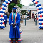 A Kent-Meridian graduate poses in front of the lion statue. STEVE HUNTER, Kent Reporter