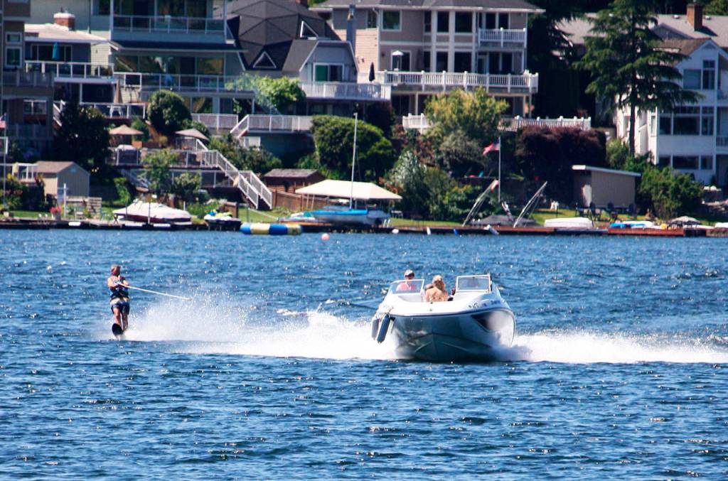 A water skier glides through Lake Meridian on Monday. STEVE HUNTER, Kent Reporter