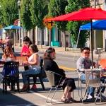People take advantage in downtown Kent of the outdoor dining along First Avenue between Gowe and Titus streets on Saturday. The street is closed to vehicle traffic between 8 a.m. and 8 p.m. each Saturday. COURTESY PHOTO, Kent Downtown Partnership