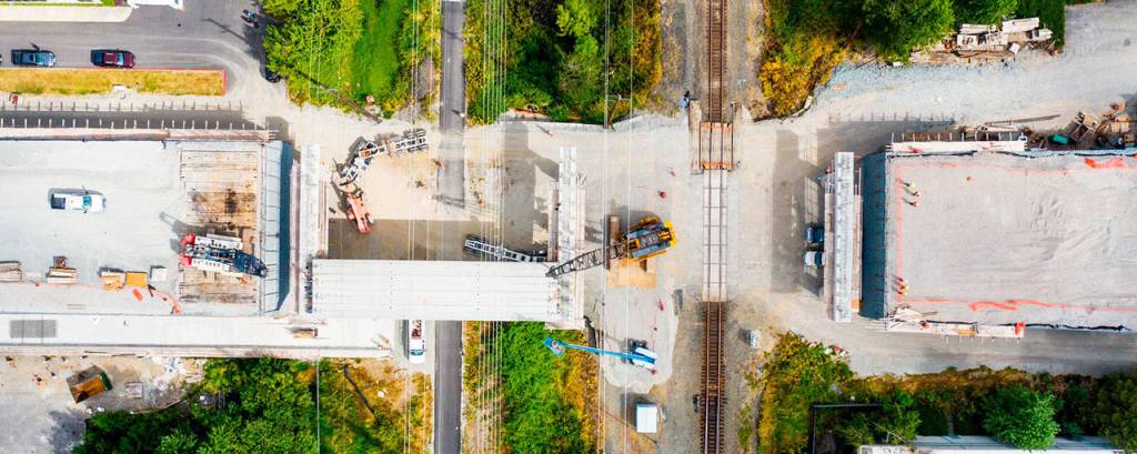Crews place bridge girders on Aug. 3 for the South 228th Street overpass that will span the Union Pacific Railroad tracks and Interurban Trail. COURTESY PHOTO, Alex Klinger, City of Kent Public Works, via drone