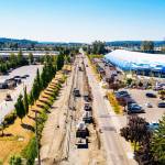 Crews work to raise 76th Avenue South by about 3 feet between South 212th Street and South 228th Street in Kent to stop the annual flooding problem along the road. Blue Origins headquarters is on the right. COURTESY PHOTO, City of Kent Public Works